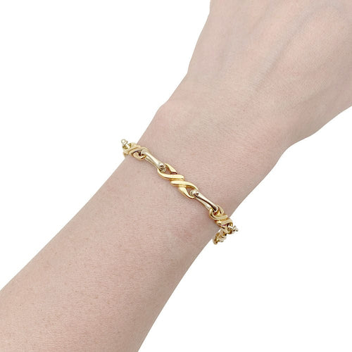 Collier Sautoir et bracelet Hermès, deux ors. 58 Facettes 33857/58