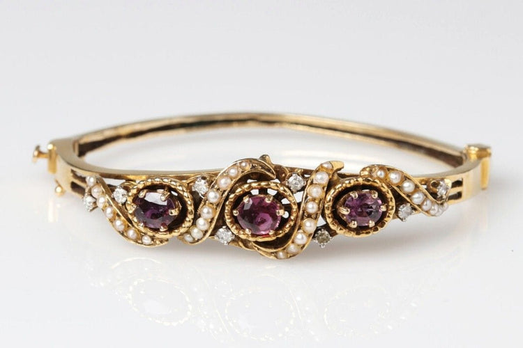 Bracelet Bracelet ancien en or jaune avec rubis, perles naturelles et diamants, Scandinavie, vers 1900 58 Facettes 10673