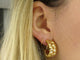 Boucles d'oreilles boucles d'oreilles CARTIER double coeur 1994 en or jaune 58 Facettes 263540