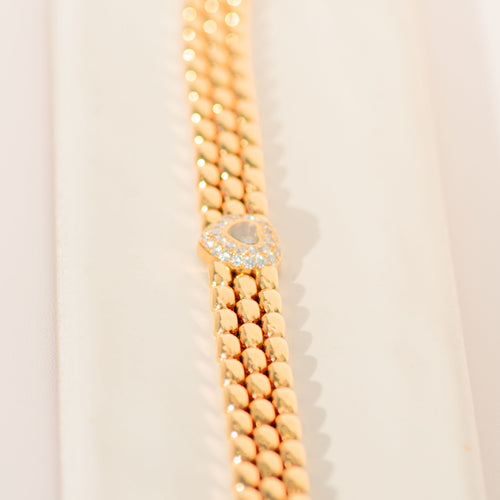 Boucles d'oreilles Chopard - Armband Happy Diamonds Herz-Motiv en or jaune et diamants 58 Facettes 3294