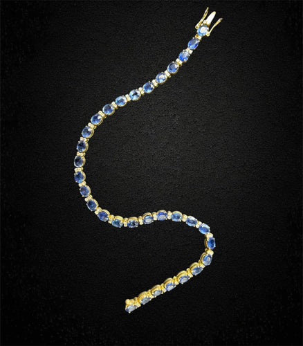 Bracelet Bracelet tennis en or jaune avec saphirs et diamants 58 Facettes