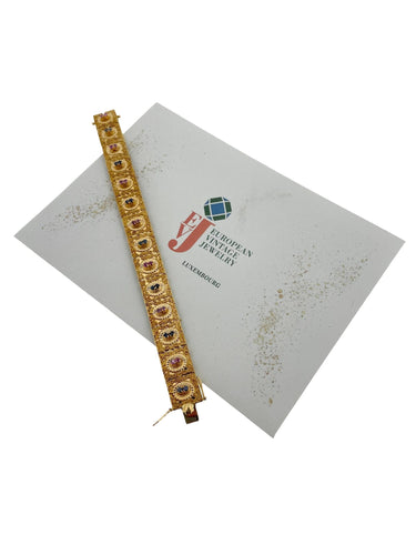 Bracelet Bracelet rétro Brevetto en or jaune, rubis et saphirs 58 Facettes