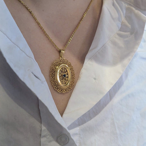 Pendentif Pendentif en or jaune et pierre bleue 58 Facettes 32068