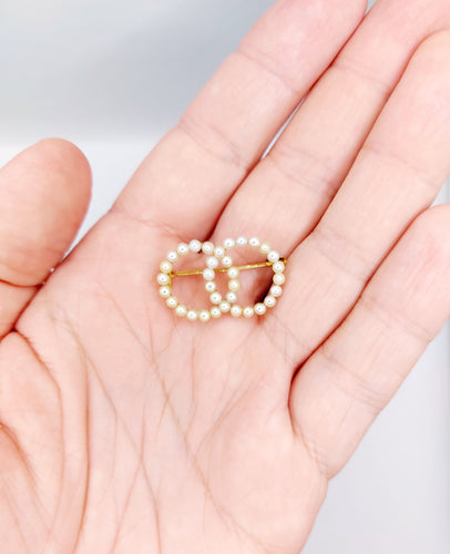 Broche Broche antique or jaune cercles infini et perles 58 Facettes A05616