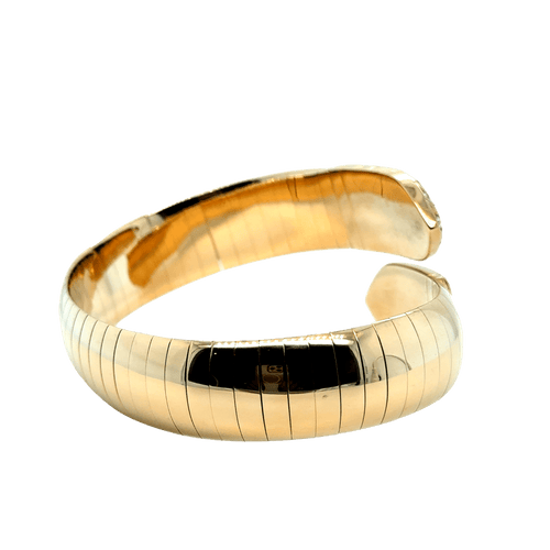 Bracelet CHAUMET - Bracelet « plume » or jaune et diamants 58 Facettes 1.0000453/1