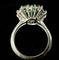 Bague 56 Bague or blanc sertie d'une émeraude de 4 carats entourée de 2,40 carats de brillants 58 Facettes
