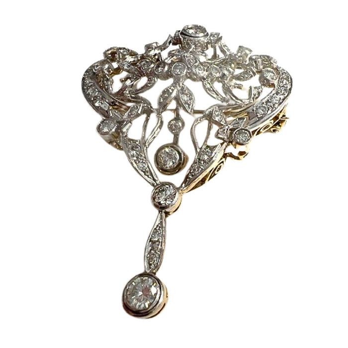 Principle of gold and platinum brooch with diamonds