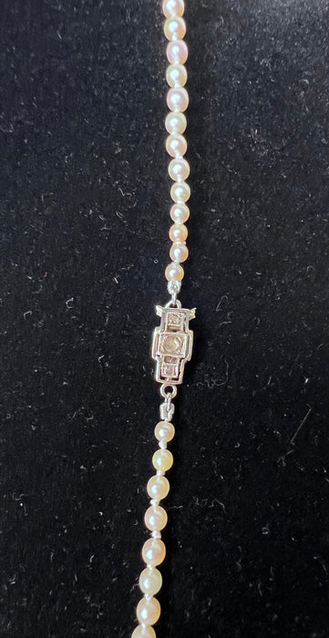 Necklace 91 akoya cultured pearls falling gold and diamond clasp