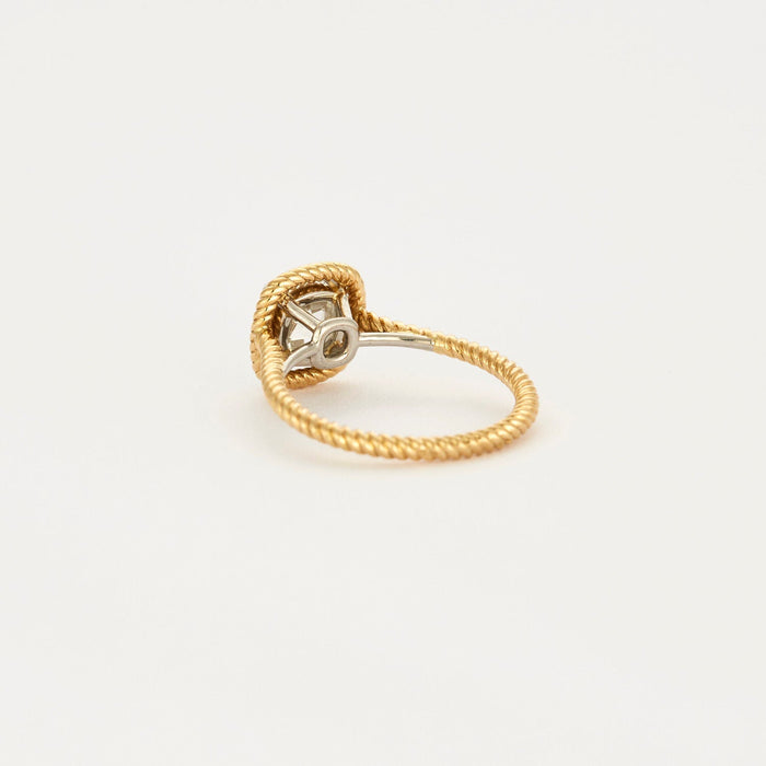 Old cut diamond twisted solitaire in yellow gold