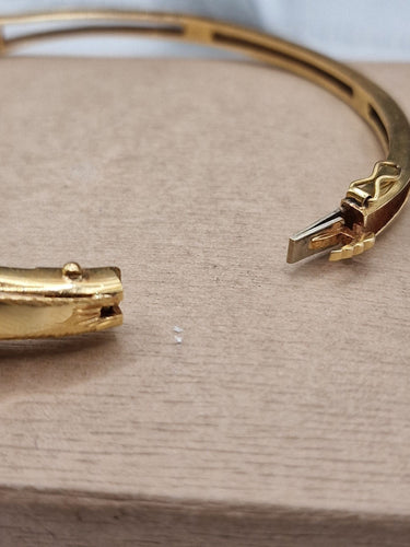 Bracelet Bracelets jonc rubis, émeraudes et diamants en or 18kt 58 Facettes