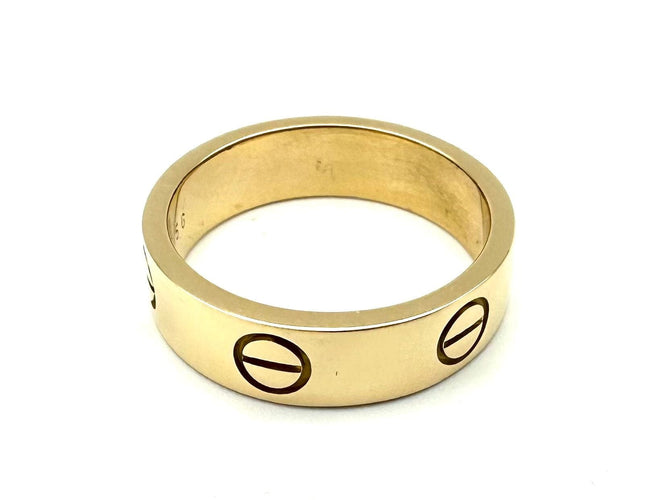 Bague 56 CARTIER. Collection "LOVE", Bague or jaune 18K 58 Facettes