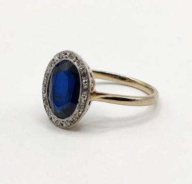Bague 50.5 Bague Pompadour deux ors ornée d'une pierre bleue et de diamants 58 Facettes