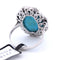 Bague Bague en or blanc avec turquoise et onyx 58 Facettes