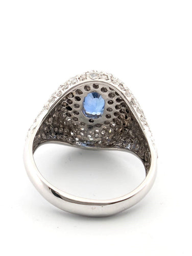 Bague Bague en or blanc avec saphir central et diamants environnants 58 Facettes