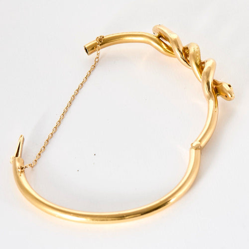 Bracelet Bracelet jonc motif serpent en or jaune et rubis 58 Facettes ROD3486