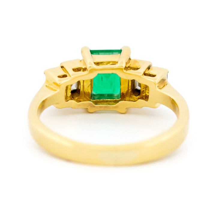 Yellow gold emerald diamond ring