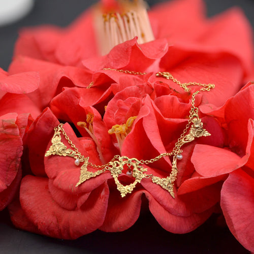 Collier Collier ancien draperie or et perles 58 Facettes 23-081