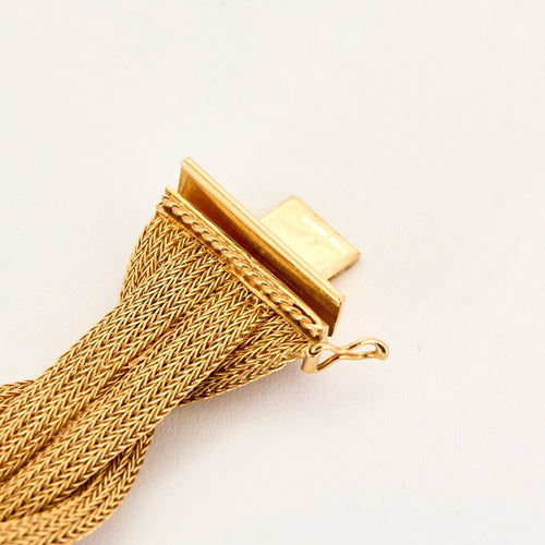 Bracelet Bracelet souple tressé or jaune 58 Facettes ENG10530