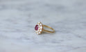 Bague Bague marguerite rubis entourage diamants 58 Facettes