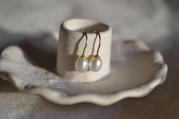 Boucles d'oreilles Pendants d'oreilles perle ovale 58 Facettes 3686