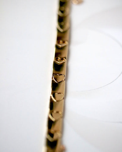 Bracelet Bracelet Maille Articulée Cœur signé "Piaget" en Or Jaune 58 Facettes A11266