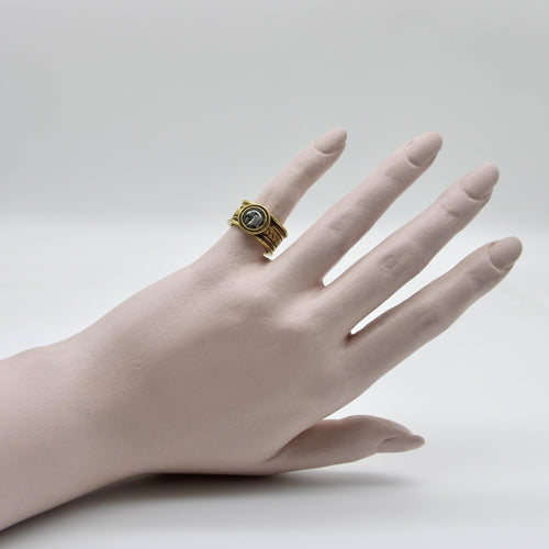 Bague Bague vintage en fil de fer doré 22 carats avec pièce d'aigle en argent antique 58 Facettes A2001F