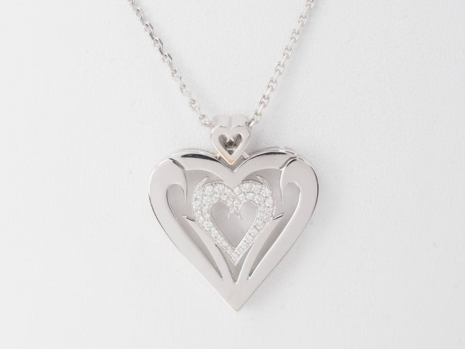 Collier Collier coeur en or blanc et diamants 58 Facettes 33084