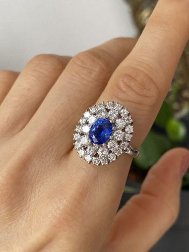 Bague 57 Bague Marguerite en or blanc, saphir et diamants 58 Facettes