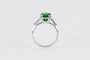 Bague 50.5 Bague en or gris serti d’un grenat tsavorite et brillants 58 Facettes 196348