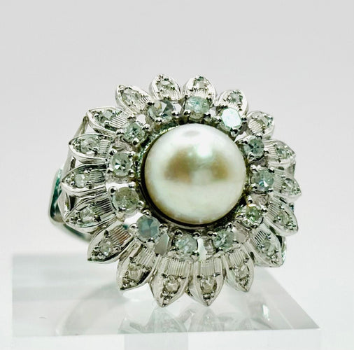 Bague Bague en or blanc avec perle centrale et diamants – Motif floral 58 Facettes 50277