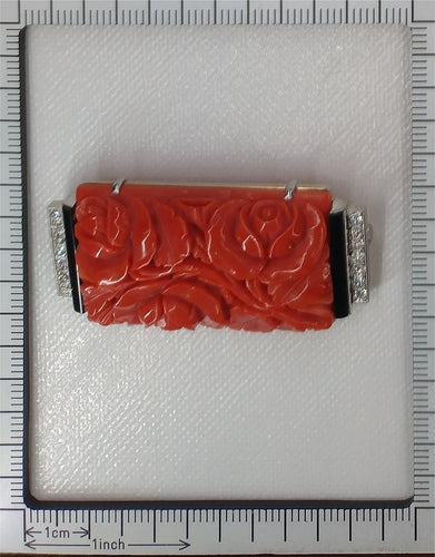 Broche Une fusion d'élégance et de zen : broche japonisante Art déco des années 1920 avec diamants, onyx et corail sanguin 58 Facettes 23277-0093