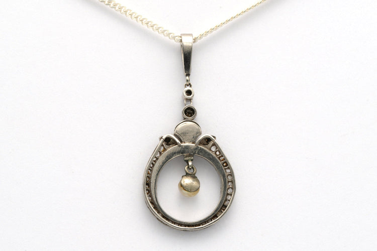 Pendentif Pendentif Art Déco en or blanc et onyx serti de diamants et d'une perle 58 Facettes B525