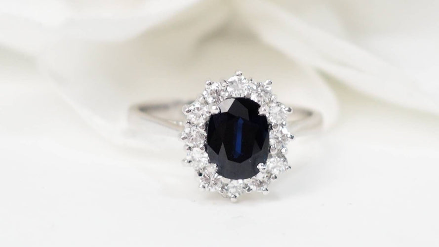 Bague Bague marguerite en or blanc, saphir et diamants 58 Facettes