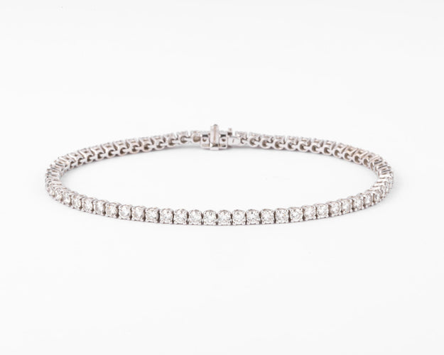 Bracelet Rivière en Or gris orné de diamant 58 Facettes 0