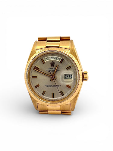 Montre Rolex vintage Day-Date 1803 en or jaune 18 carats 58 Facettes