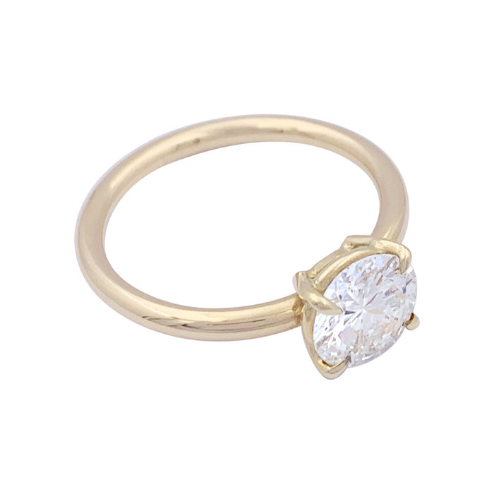 Yellow gold diamond solitaire ring.