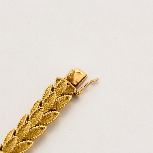 Bracelet Bracelet or jaune à motif de feuilles 58 Facettes CHAL0241