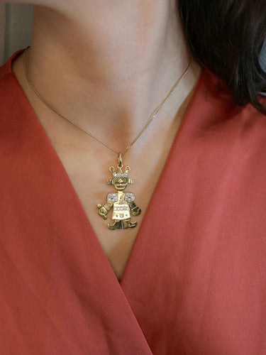 Pendentif POMELLATO - Pendentif Petite Reine articulé 2 ors diamants 58 Facettes J544