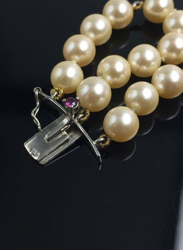 Bracelet Bracciale novecentesco a tre fili di perle 58 Facettes