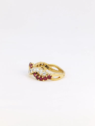 Bague 52 Bague vintage torsadée en or, diamants et rubis 58 Facettes 825