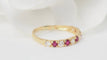 Bague 53 Demi alliance en or jaune, rubis et diamants 58 Facettes 32930