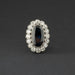 Bague 51 Bague marguerite en platine, saphir et diamants. 58 Facettes