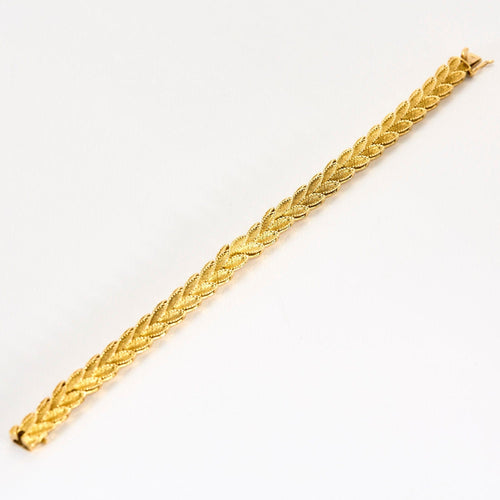 Bracelet Bracelet or jaune à motif de feuilles 58 Facettes CHAL0241