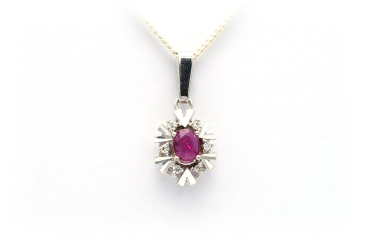 Pendentif Pendentif 1970 en or blanc serti d'un grenat et de diamants 58 Facettes B634