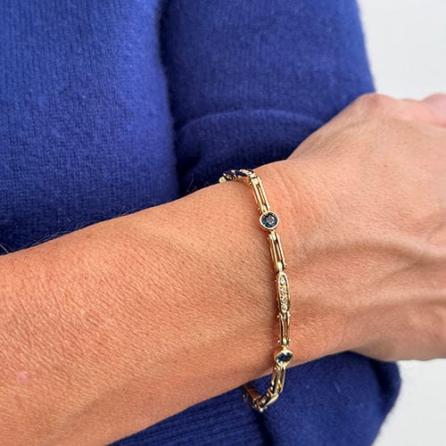 Geelgouden armband met segmenten, saffieren en diamanten 