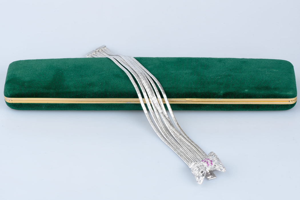 18-karaats witgouden knooparmband uit het Art-Deco tijdperk