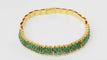 Bracelet Bracelet souple ancien en or jaune et émeraudes 58 Facettes 32752