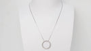 Collier Collier pendentif cercle en or blanc et diamants 58 Facettes 32920