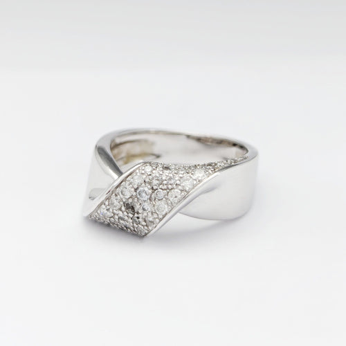 Bague 55 Bague torsade en or blanc et diamants 58 Facettes 32648