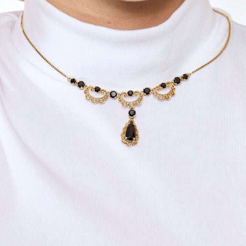 Collier Collier draperie or jaune, grenats 58 Facettes PER1505